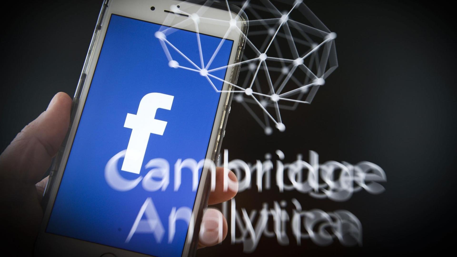 Graphische Darstellung zum Datenskandal der Firma Cambridge Analytica. Zu sehen ist das Facebook Logo auf einem Smartphone. Graphische Darstellung zum Datenskandal der Firma Cambridge Analytica. Zu sehen ist das Facebook Logo auf einem Smartphone.