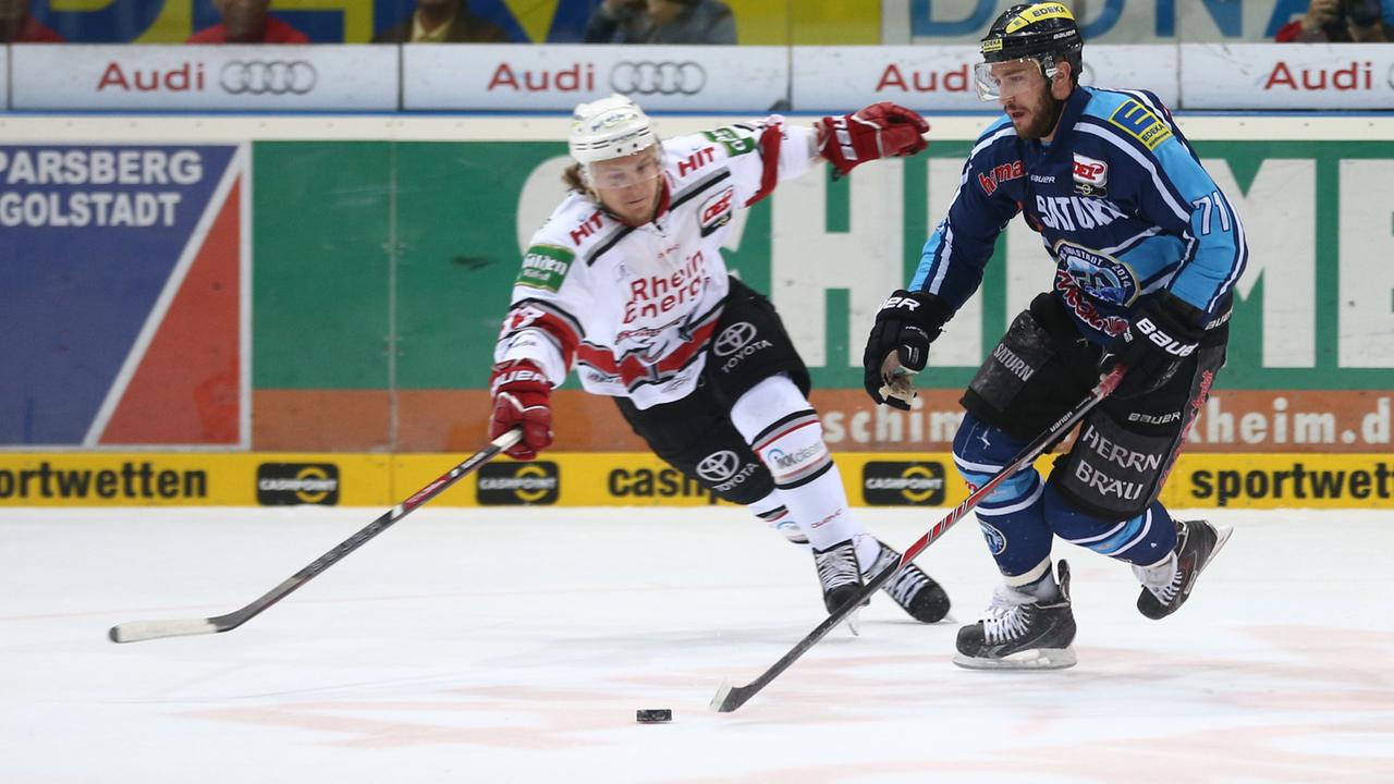 Daniel Tjärnqvist (Köln, links) und Travis Turnbull (Ingolstadt) im Finale um die deutsche Eishockey-Meisterschaft 2014 Daniel Tjärnqvist (Köln, links) und Travis Turnbull (Ingolstadt) im Finale um die deutsche Eishockey-Meisterschaft 2014