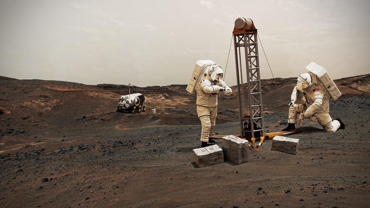Künstlerische Darstellung von Astronauten, die auf dem Mars nach Wasser bohren. Künstlerische Darstellung von Astronauten, die auf dem Mars nach Wasser bohren.