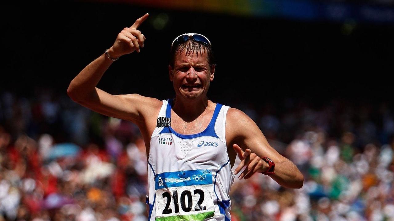 Geher Alex Schwazer weint im Zieleinlauf Geher Alex Schwazer weint im Zieleinlauf