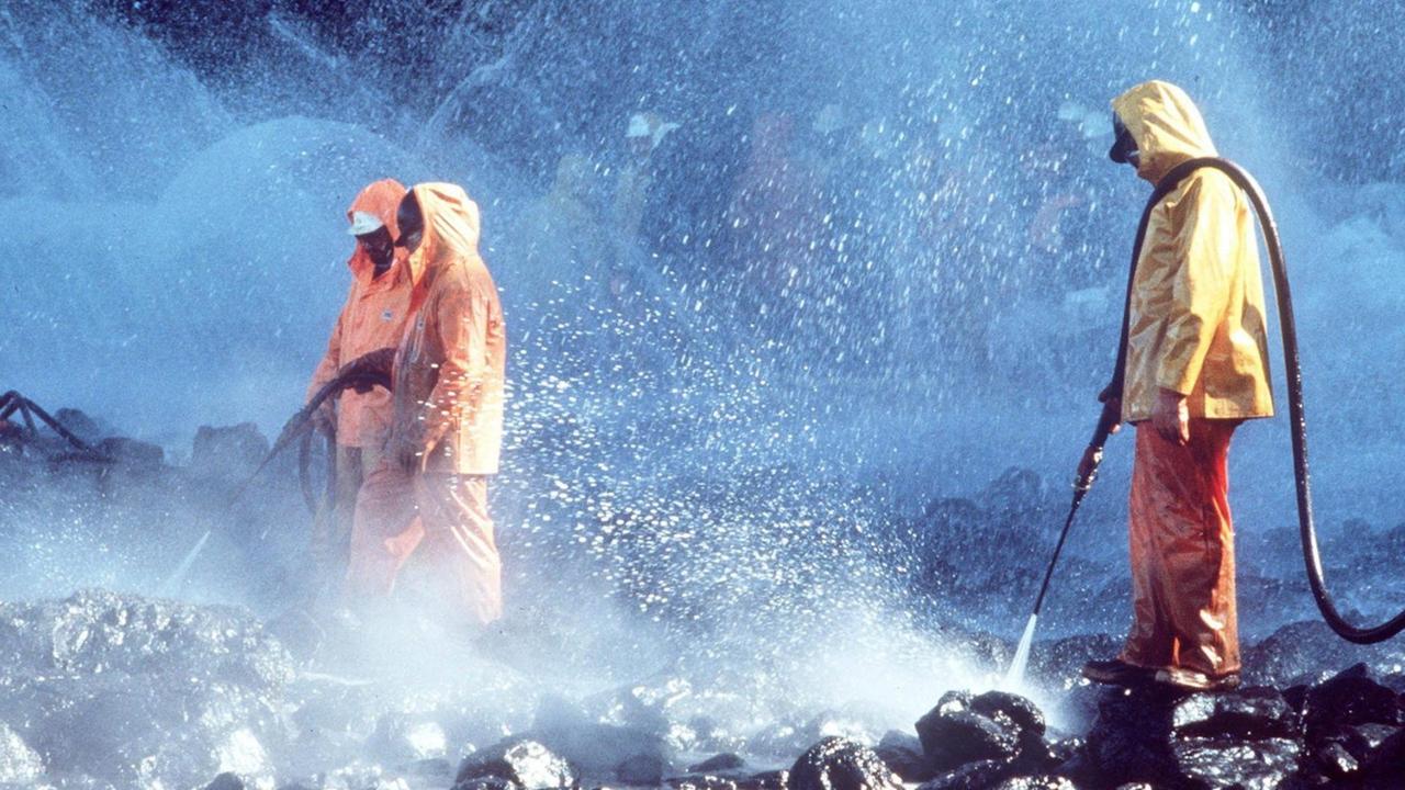 epa04133267 Cleanup continues as workers steam blast rocks and wash down shorelines soaked in crude oil from the leaking tanker Exxon Valdez in Prince William Sound, Alaska, USA, 28 March, 1989. Sea otters were among 20 marine species threatened by the 1989 Exxon Valdez oil spill in Alaska. Many sea otters died from exposure to the 40,000 tons of sticky crude oil spilled in the tanker disaster. Their population has since rebounded to nearly 4,300 in picturesque Prince William Sound, according to a study by the US Geological Survey. Even 25 years later, though, remnants of the oil linger in the sea and on the 2,400 km of contaminated shoreline in and around Prince William Sound, a marine ecosystem protected from the open Gulf of Alaska by barrier-like islands. EPA/US COAST GUARD HANDOUT EDITORIAL USE ONLY | epa04133267 Cleanup continues as workers steam blast rocks and wash down shorelines soaked in crude oil from the leaking tanker Exxon Valdez in Prince William Sound, Alaska, USA, 28 March, 1989. Sea otters were among 20 marine species threatened by the 1989 Exxon Valdez oil spill in Alaska. Many sea otters died from exposure to the 40,000 tons of sticky crude oil spilled in the tanker disaster. Their population has since rebounded to nearly 4,300 in picturesque Prince William Sound, according to a study by the US Geological Survey. Even 25 years later, though, remnants of the oil linger in the sea and on the 2,400 km of contaminated shoreline in and around Prince William Sound, a marine ecosystem protected from the open Gulf of Alaska by barrier-like islands. EPA/US COAST GUARD HANDOUT EDITORIAL USE ONLY |