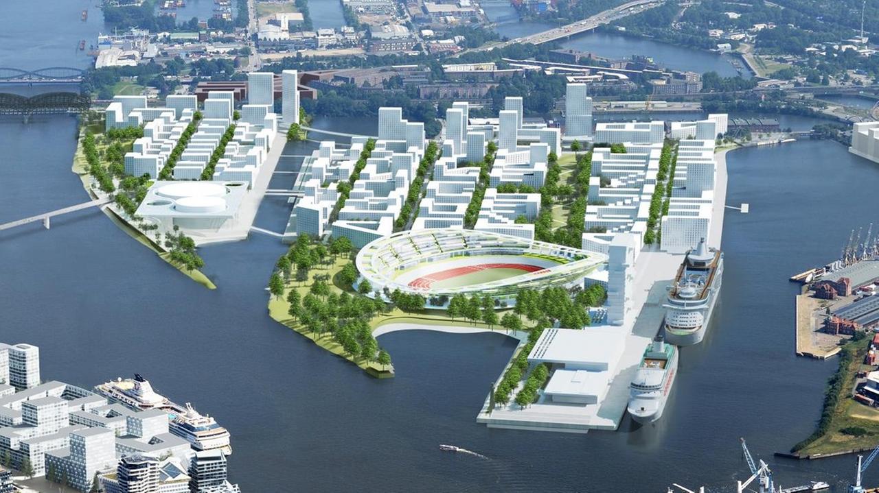 Zu sehen ist eine Foto-Simulation, die ein Stadion und neue Wohnhäuser zeigt. Alles steht im Hamburger Hafen auf der Elbinsel "Kleiner Grasbrook." Zu sehen ist eine Foto-Simulation, die ein Stadion und neue Wohnhäuser zeigt. Alles steht im Hamburger Hafen auf der Elbinsel "Kleiner Grasbrook."
