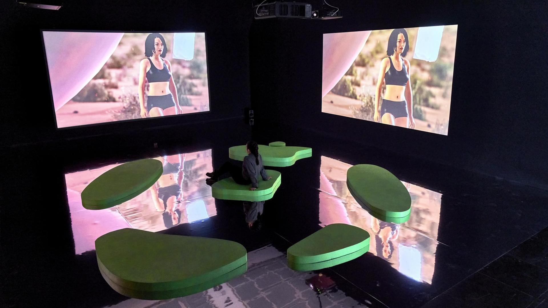 Ausstellungsansicht mit dem Werk "Feel My Metaverse" von Keiken + George Jasper Stone von 2019, in der Ausstellung "How to Make a Paradise – Sehnsucht und Abhängigkeit in generierten Welten" im Frankfurter Kunstverein Ausstellungsansicht mit dem Werk "Feel My Metaverse" von Keiken + George Jasper Stone von 2019, in der Ausstellung "How to Make a Paradise – Sehnsucht und Abhängigkeit in generierten Welten" im Frankfurter Kunstverein