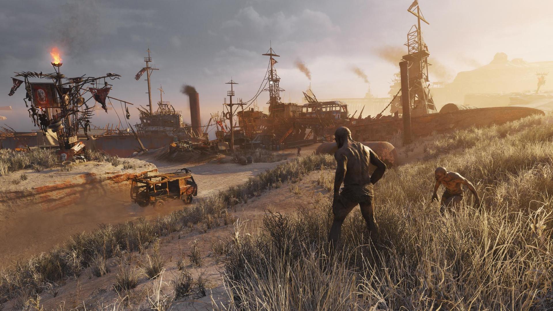 Die Szene aus dem Spiel "Metro: Exodus" zeit zwei ungeheuerähnliche Gestalten, die den Abhang zu einem Industrieschrottplatz herunterlaufen Die Szene aus dem Spiel "Metro: Exodus" zeit zwei ungeheuerähnliche Gestalten, die den Abhang zu einem Industrieschrottplatz herunterlaufen