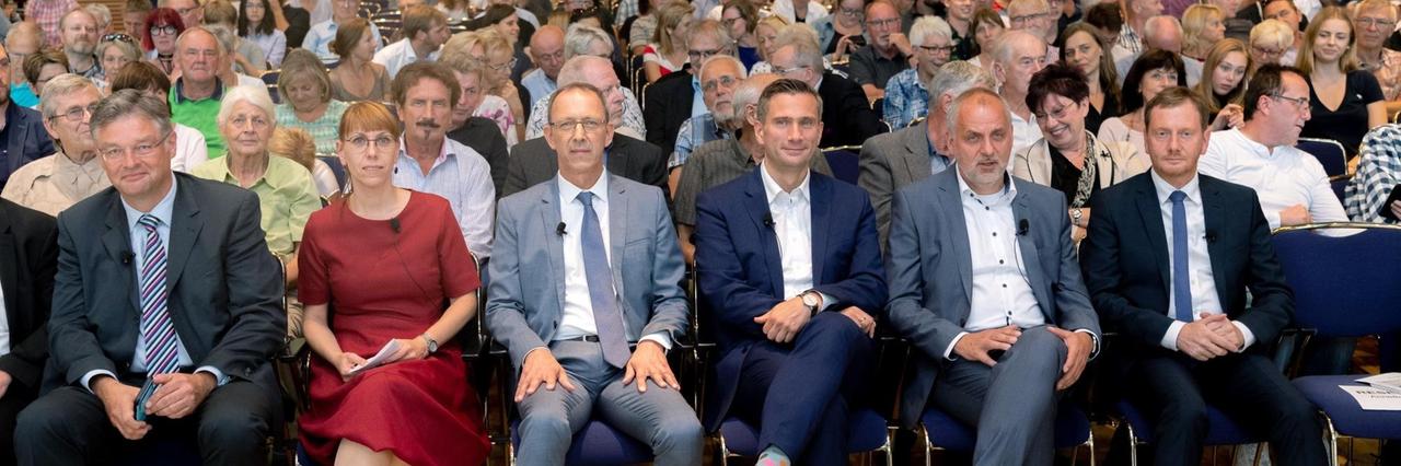 Die Spitzenkandidaten in Sachsen (von links nach rechts): Holger Zastrow (FDP), Katja Meier (Bündnis 90/Die Grünen), Jörg Urban (AfD), Martin Dulig (SPD), Rico Gebhardt (Die Linke) und Michael Kretschmer (CDU). Die Spitzenkandidaten in Sachsen (von links nach rechts): Holger Zastrow (FDP), Katja Meier (Bündnis 90/Die Grünen), Jörg Urban (AfD), Martin Dulig (SPD), Rico Gebhardt (Die Linke) und Michael Kretschmer (CDU).
