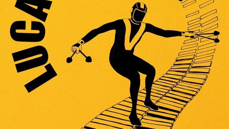 Logo mit einem Surfer auf den Klangplatten eines Vibraphones Logo mit einem Surfer auf den Klangplatten eines Vibraphones