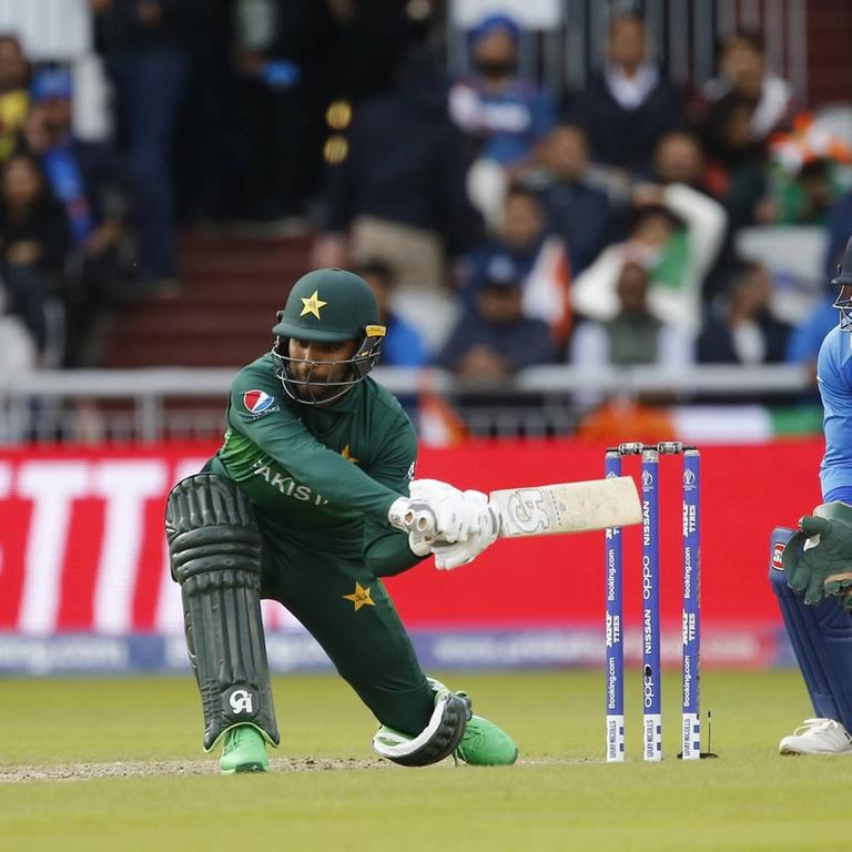 16th June 2019, Old Trafford, Manchester, England; ICC World Cup Cricket, India versus Pakistan; Fakhar Zaman of Pakistan plays a sweep shot PUBLICATIONxINxGERxSUIxAUTxHUNxSWExNORxDENxFINxONLY ActionPlus12144781 AlanxMartin  