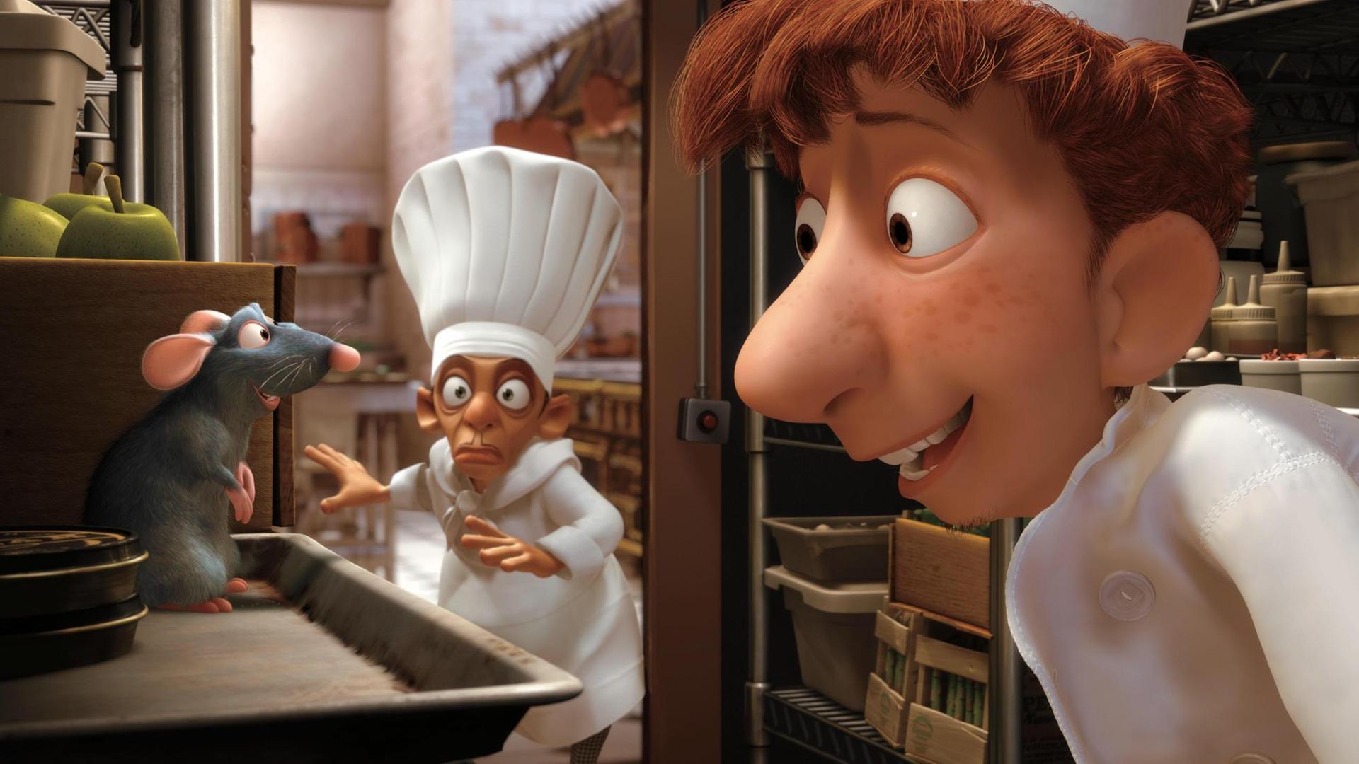Im Kinofilm "Ratatouille" sitzt die Ratte Remy in der Küche eines Restaurants in Paris und wird von Chefkoch Skinner (M) und Hilfskoch Linguini (r) angestarrt (undatierte Filmszene). Im Kinofilm "Ratatouille" sitzt die Ratte Remy in der Küche eines Restaurants in Paris und wird von Chefkoch Skinner (M) und Hilfskoch Linguini (r) angestarrt (undatierte Filmszene).