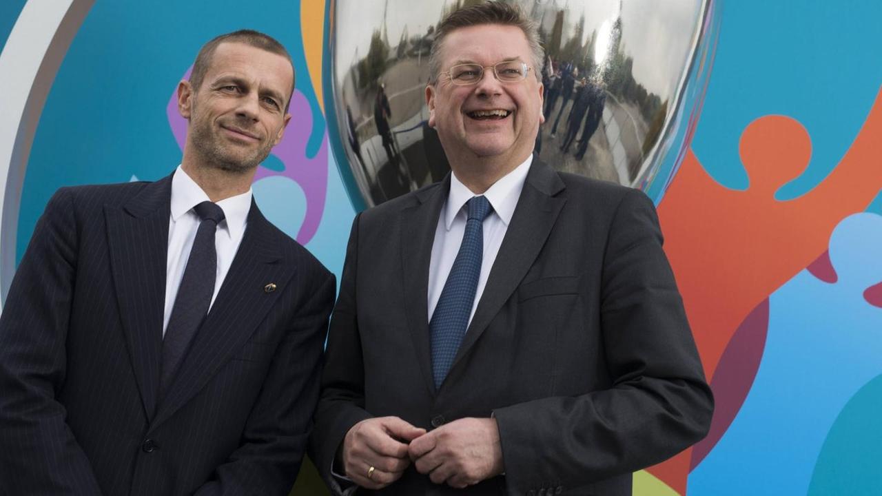 UEFA-Präsident Aleksander Ceferin (l.) mit DFB-Präsident Reinhard Grindel