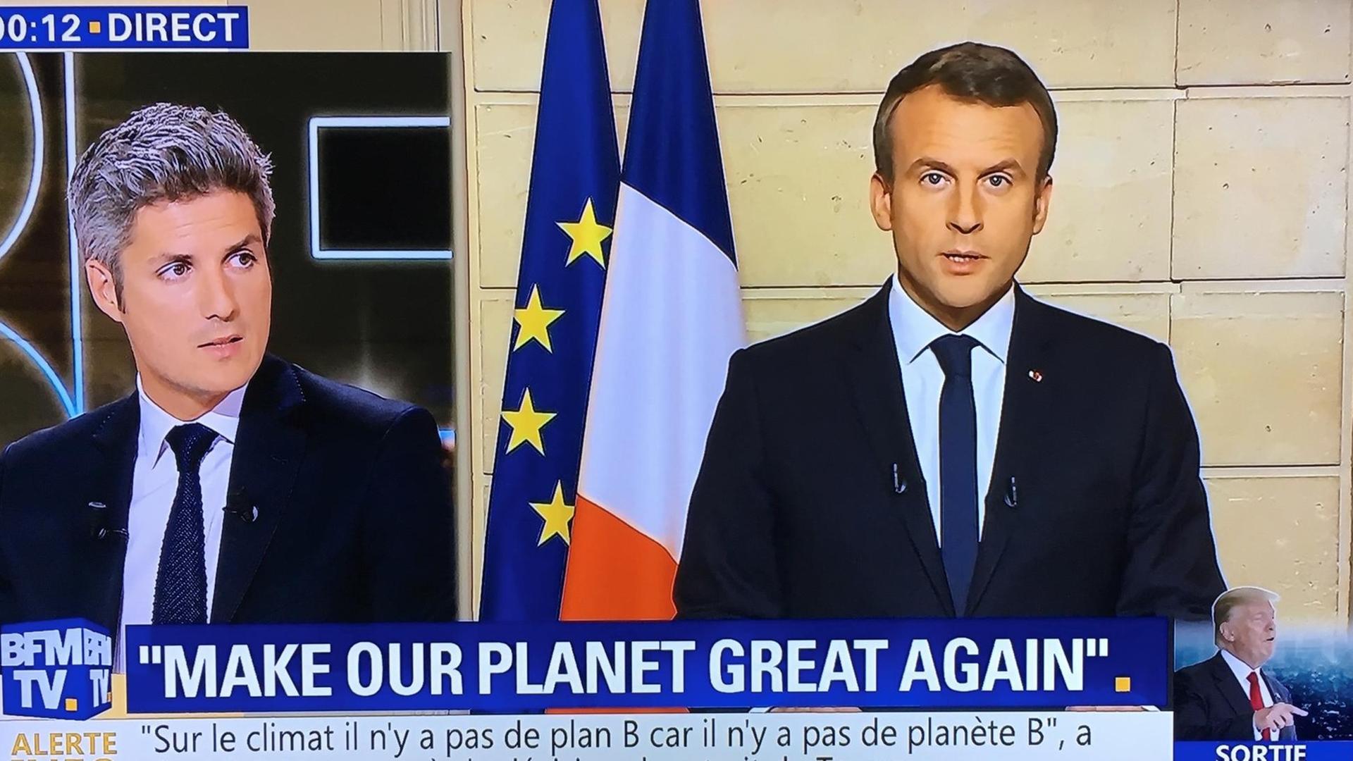 Frankreichs Präsident Macron in einer Fernsehsendung, eingeblendet der Slogan: "Make Our Planet Great Again".