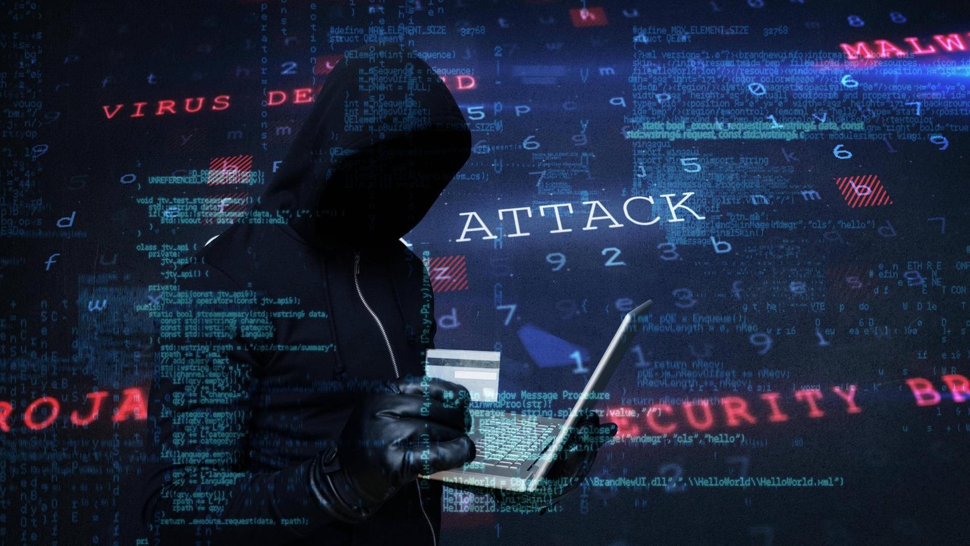 Symbolbild, das einen Hacker im Kapuzenpullover und mit Lederhandschuhen zeigt. In der Hand hält er eine Kreditkarte und ein Laptop. Symbolbild, das einen Hacker im Kapuzenpullover und mit Lederhandschuhen zeigt. In der Hand hält er eine Kreditkarte und ein Laptop.