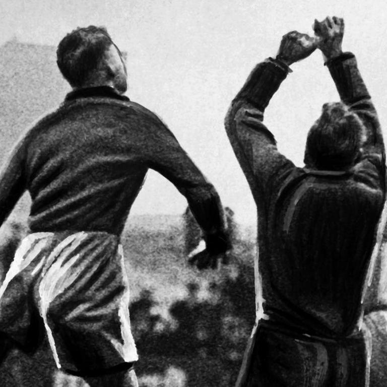 Fußballspiel in den zwanziger Jahren.