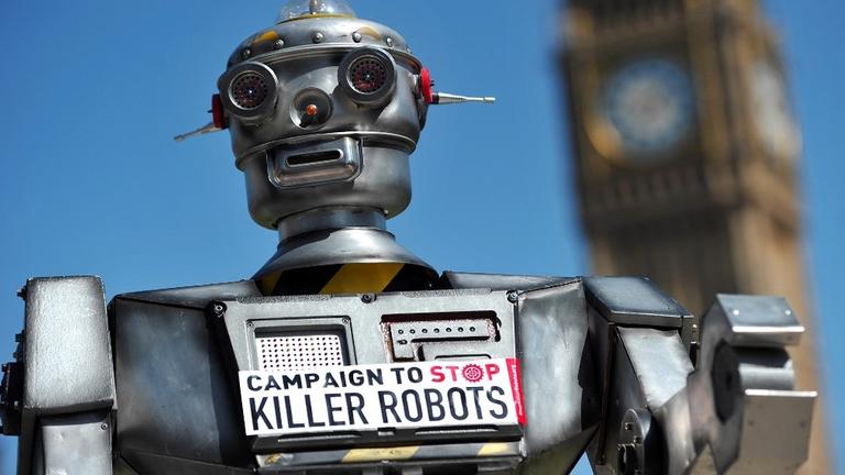 A mock "killer robot" is pictured in central London on April 23, 2013 during the launching of the Campaign to Stop "Killer Robots," which calls for the ban of lethal robot weapons that would be able to select and attack targets without any human intervention. The Campaign to Stop Killer Robots calls for a pre-emptive and comprehensive ban on the development, production, and use of fully autonomous weapons. AFP PHOTO/CARL COURT (Photo by CARL COURT / AFP)