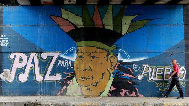 Wandbild in der Stadt Cali in Kolumbien, wo das Ende des jahrzehntelangen Bürgerkriegs in Sicht ist.