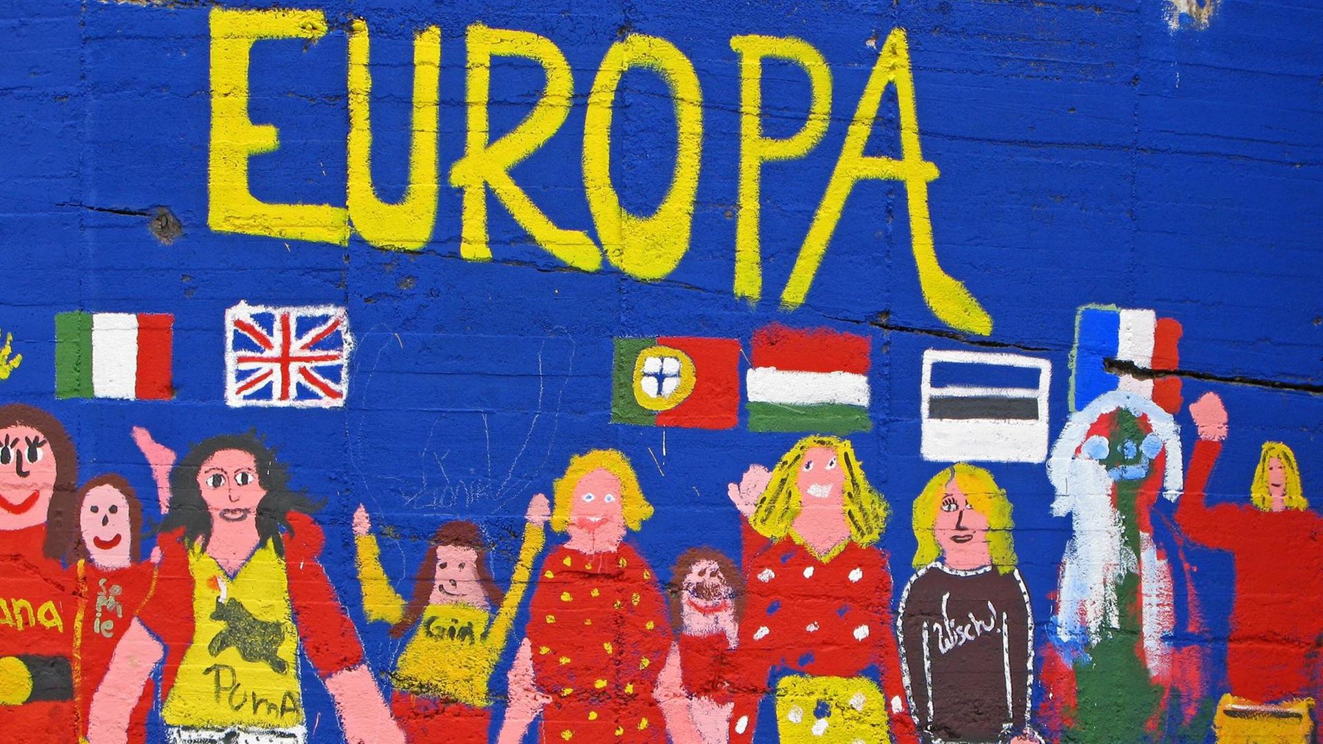 Bunte Wandmalerei: Menschen halten sich an den Händen. Darüber steht: "Europa". Bunte Wandmalerei: Menschen halten sich an den Händen. Darüber steht: "Europa".