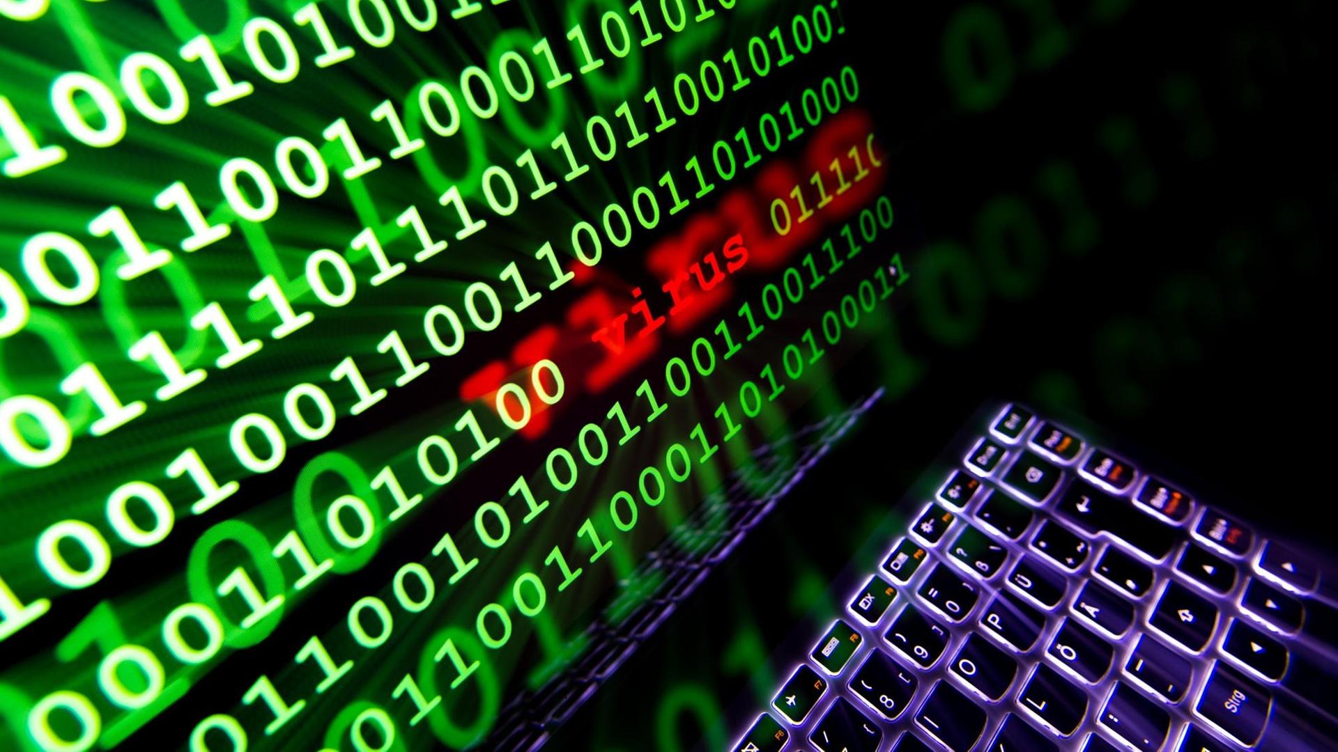 Auf einem Laptopbildschirm wird das Wort "Virus" angezeigt. Auf einem Laptopbildschirm wird das Wort "Virus" angezeigt.