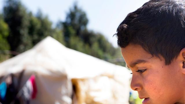 Ein Kind aus Syrien in einem Flüchtlingslager im Libanon
