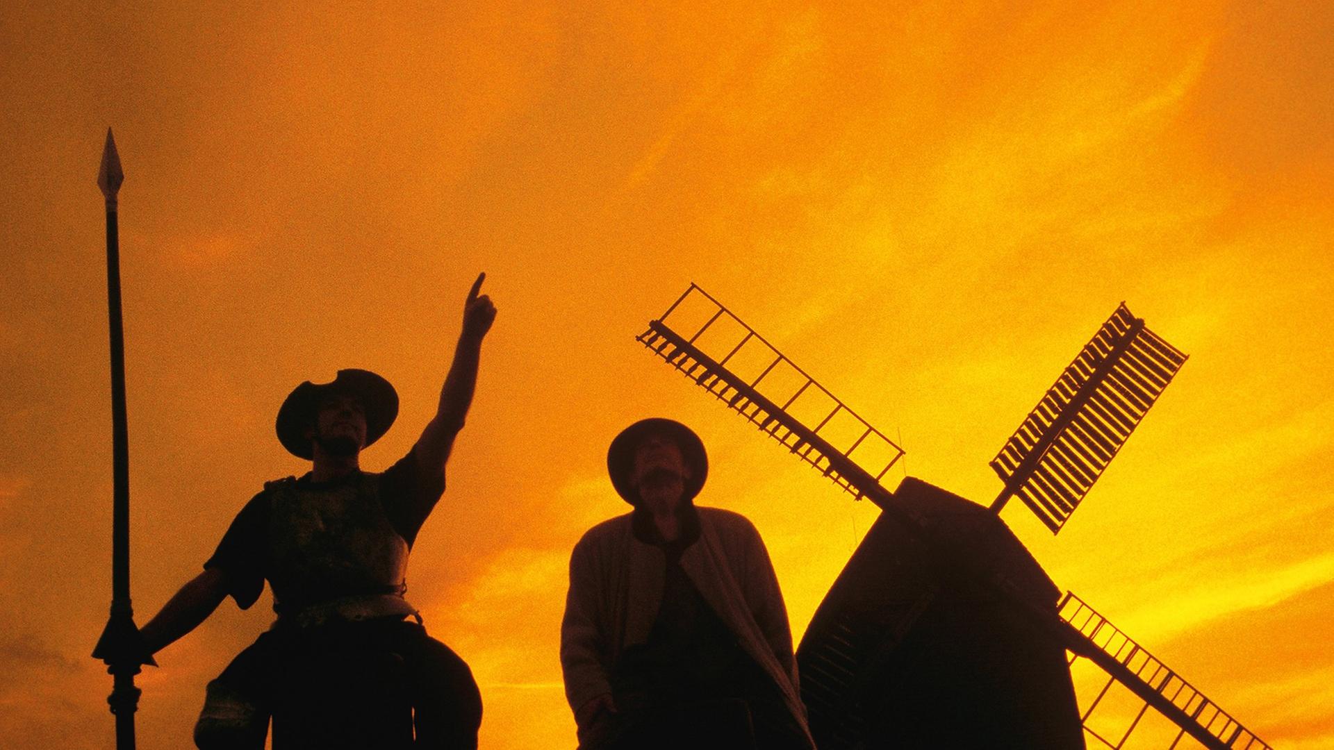 Don Quijote mit Sancho Pansa vor einer Windmühle. Don Quijote mit Sancho Pansa vor einer Windmühle.