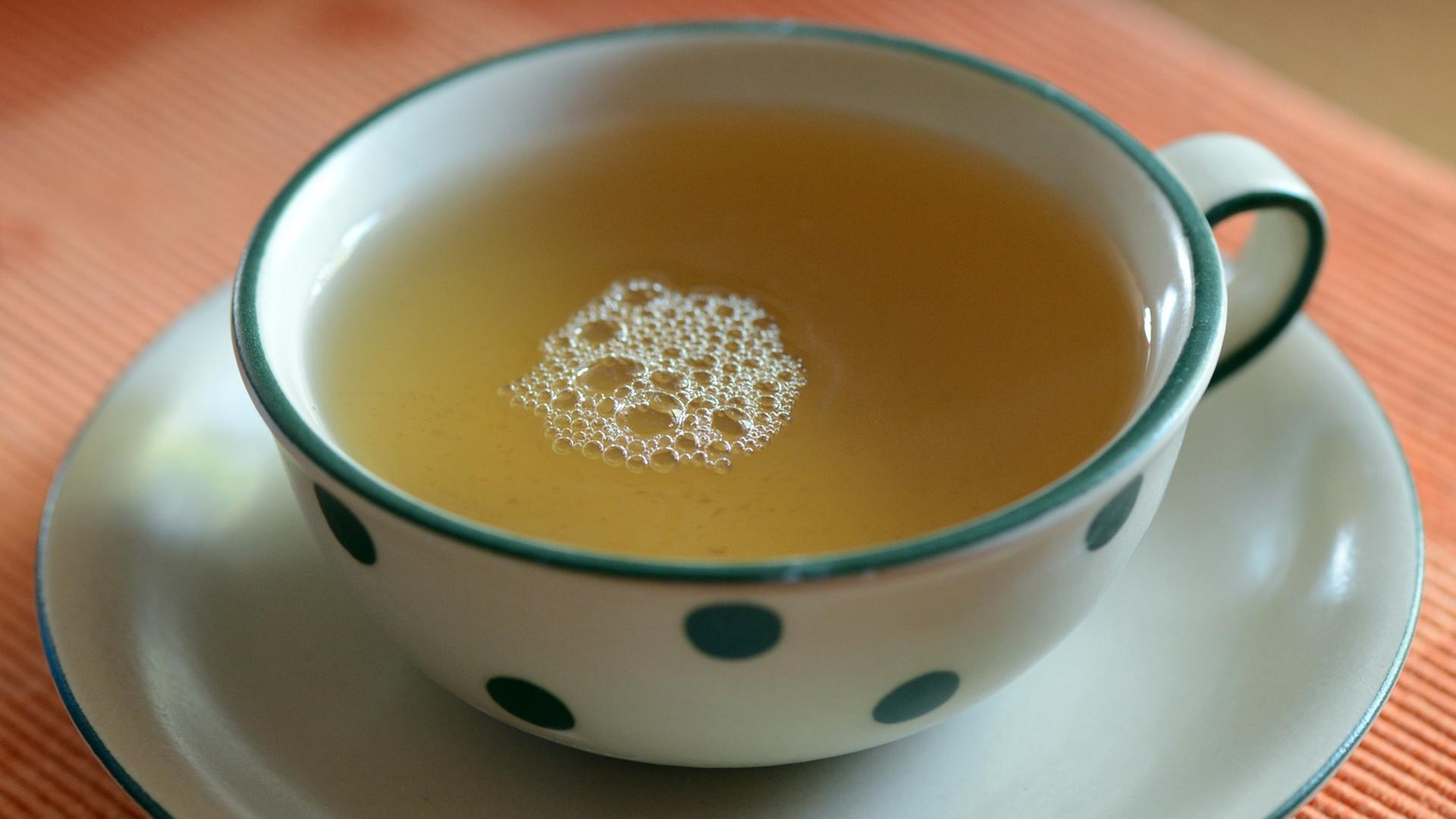 Ein Tasse grüner Tee Ein Tasse grüner Tee