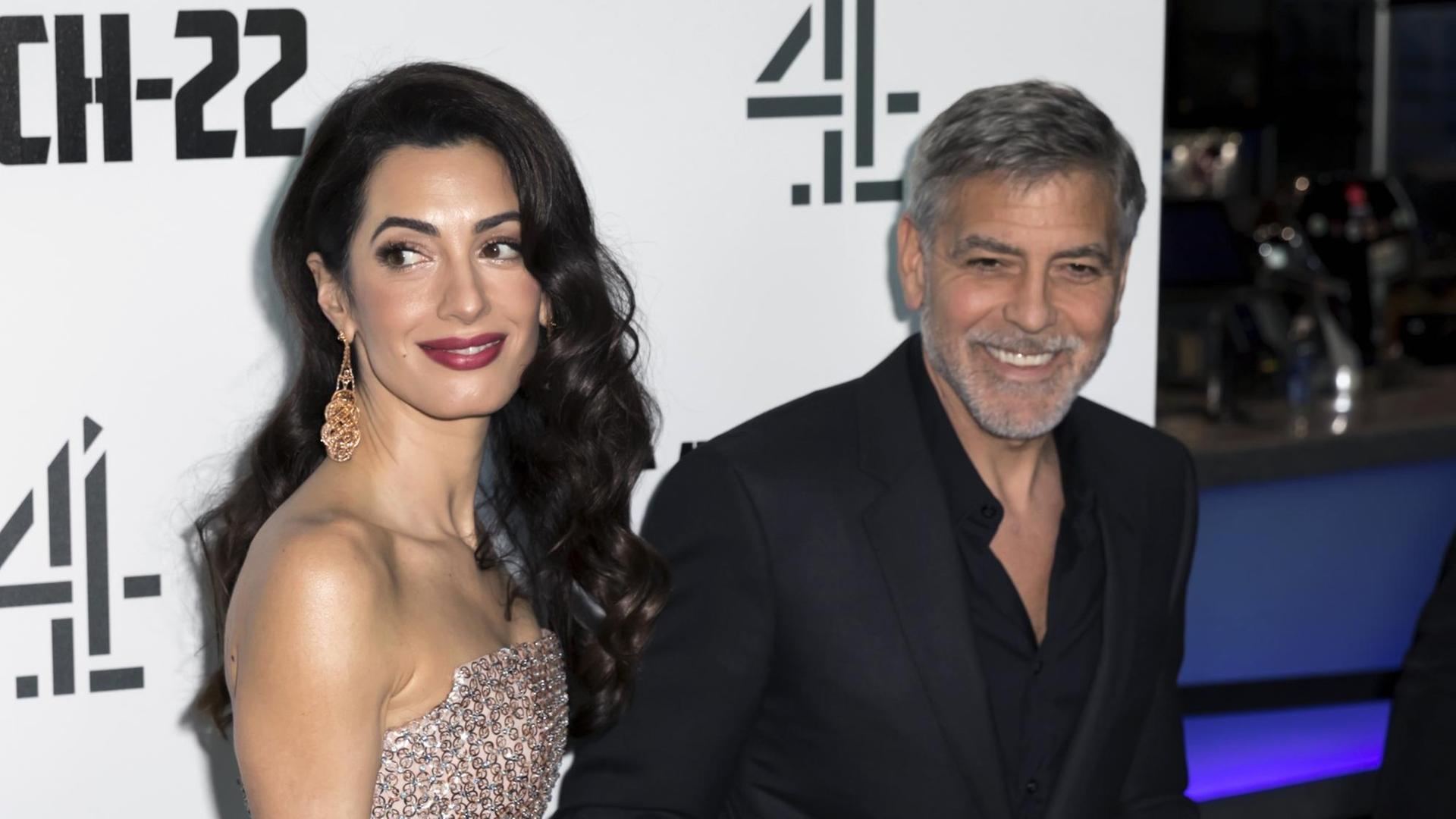 Amal und George Clooney auf dem roten Teppich bei einer TV-Premiere Amal und George Clooney auf dem roten Teppich bei einer TV-Premiere