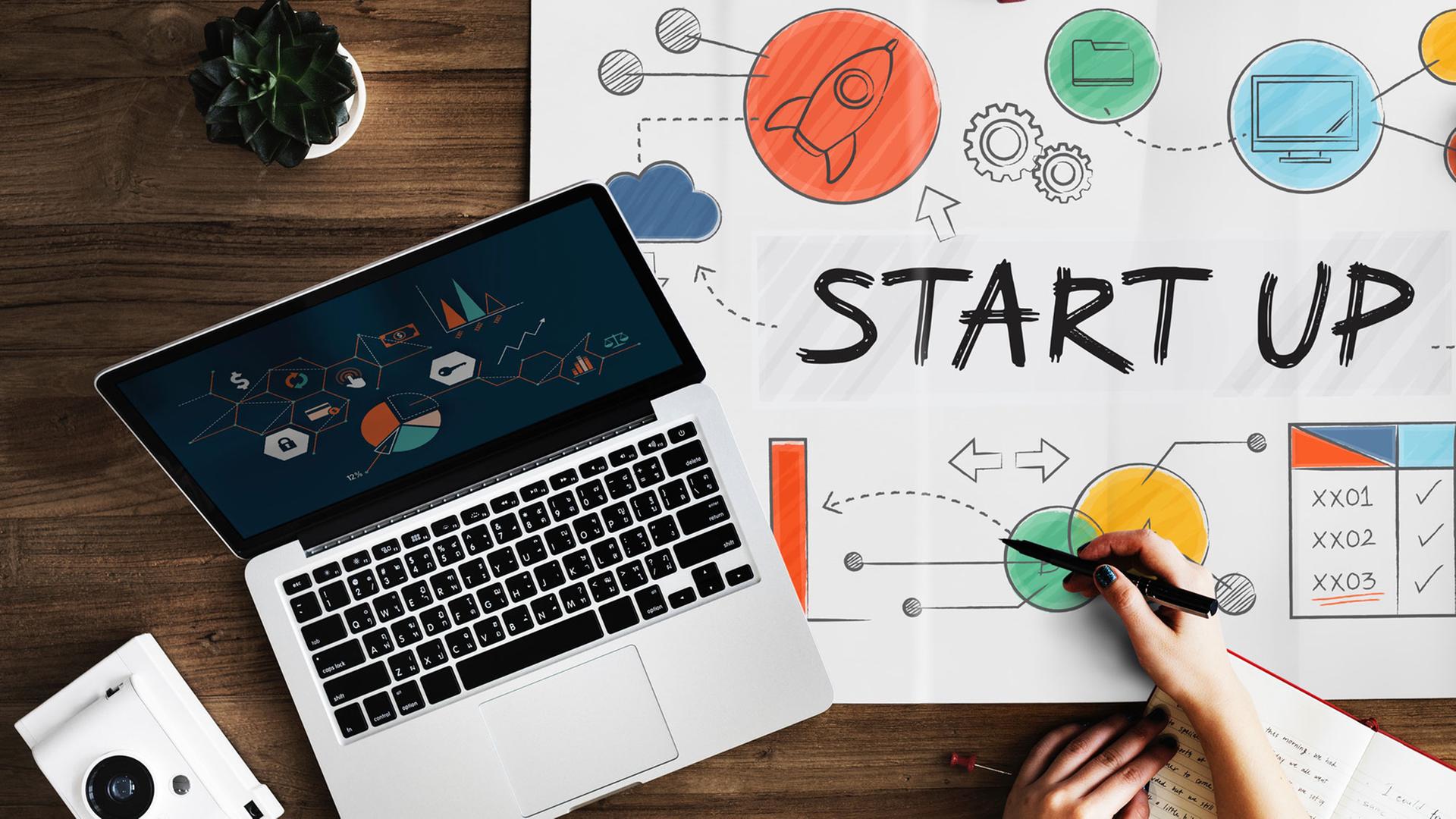 Notebook in einem Start-up Notebook in einem Start-up
