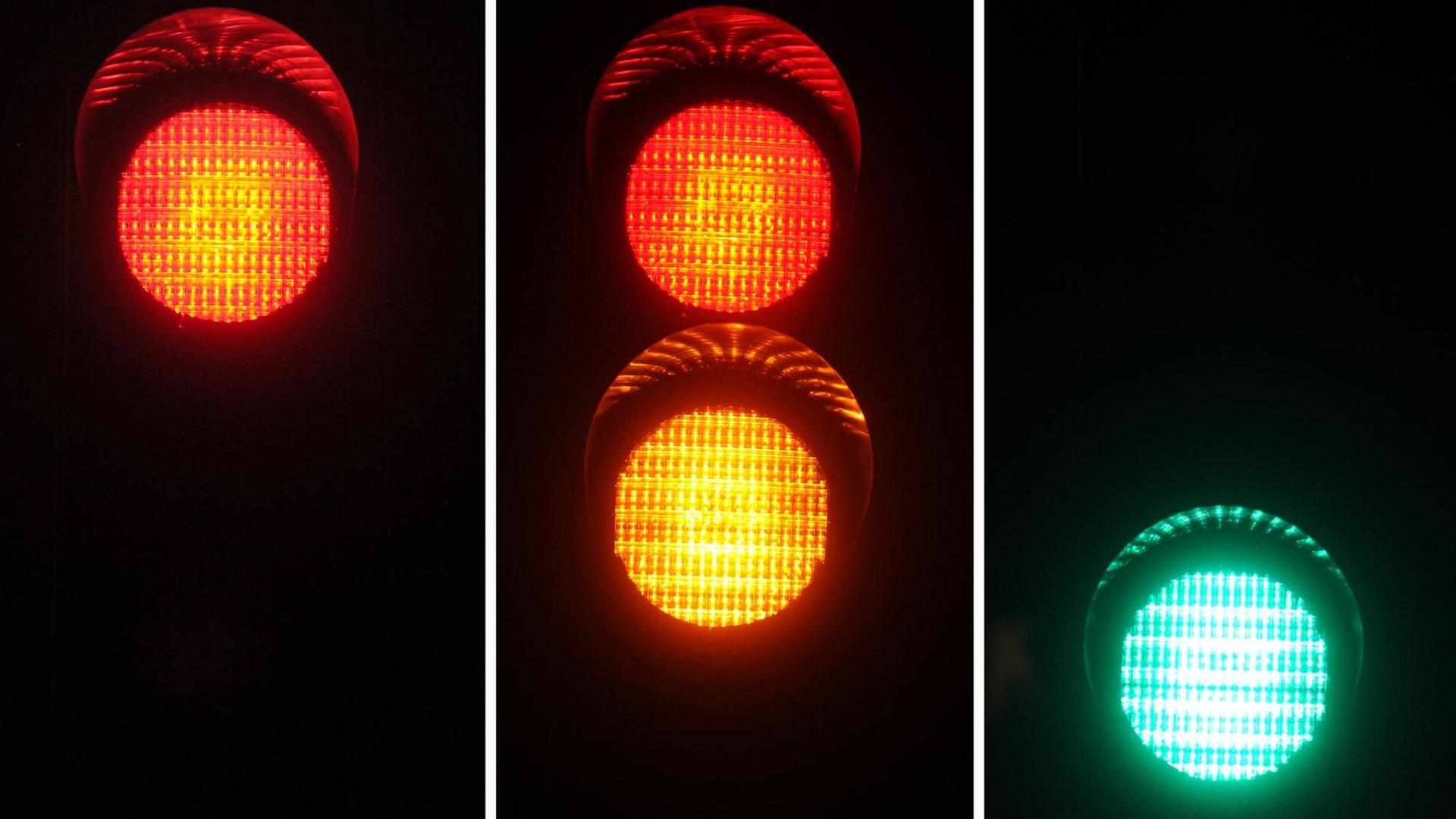 Rotes, rot-gelbes und grünes Ampellicht ist am Dienstag (03.01.2012) in München (Oberbayern) an einer Fußgängerampel bei Nacht zu sehen