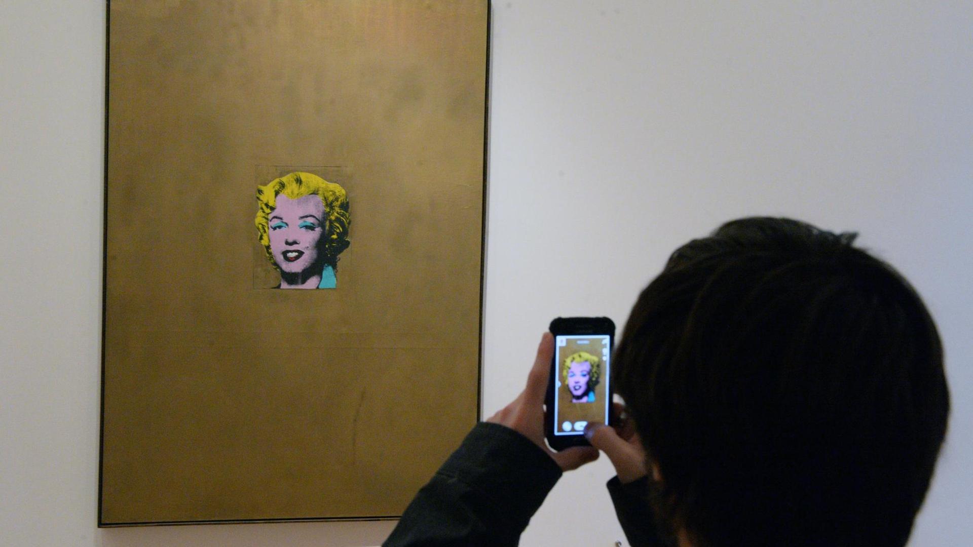 Die Arbeit "Gold Marilyn Monroe" des Künstlers Andy Warhol am 08.03.2014 im New Yorker Museum of Modern Art, MoMA. Die Arbeit "Gold Marilyn Monroe" des Künstlers Andy Warhol am 08.03.2014 im New Yorker Museum of Modern Art, MoMA.