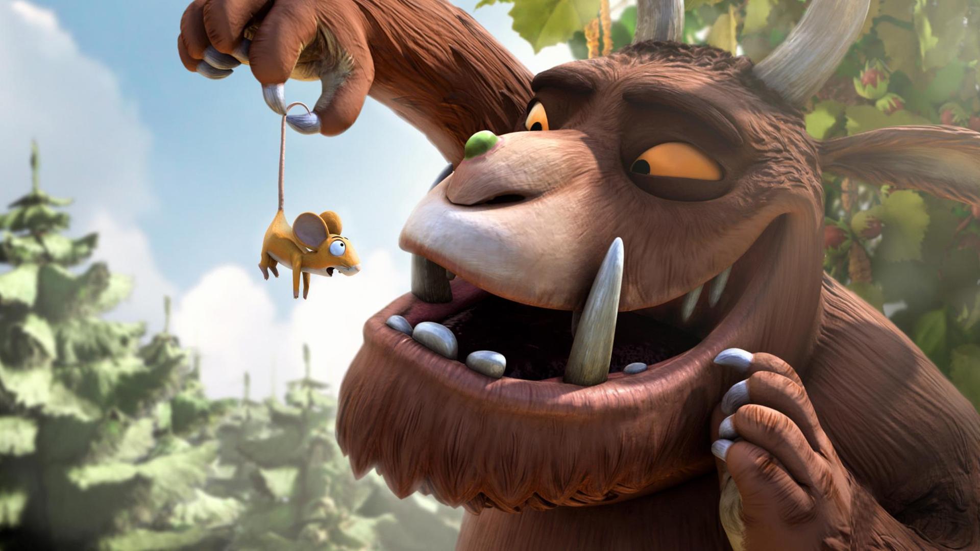 Das Monster "Grüffelo" hält in dem gleichnamigen Zeichentrickfilm die Maus in der Luft. Das Monster "Grüffelo" hält in dem gleichnamigen Zeichentrickfilm die Maus in der Luft.