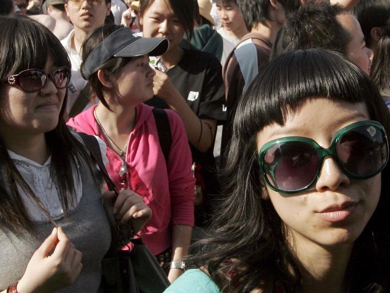 Junge Chinesen bei einem Musikfestival in Peking