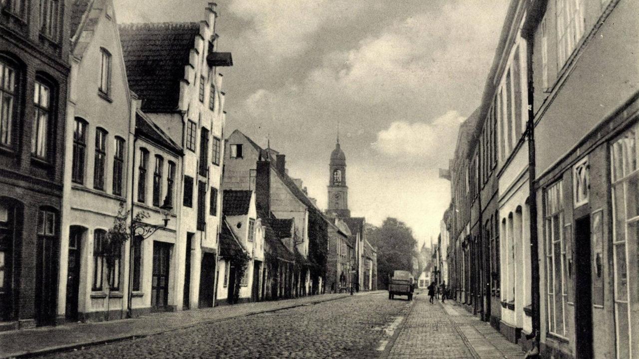 Historische Postkarte einer Ansicht der Westhafenstrasse mit Remonstranten-Kirche Historische Postkarte einer Ansicht der Westhafenstrasse mit Remonstranten-Kirche