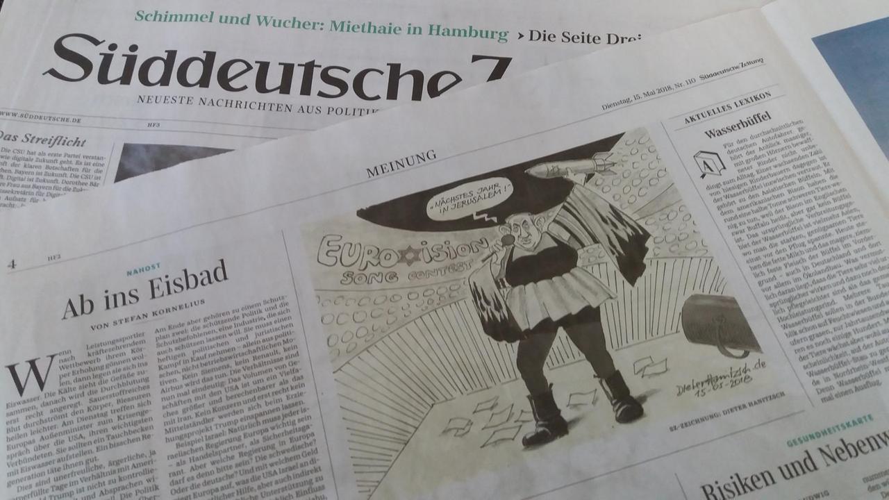 Die Zeichnung des Karikaturisten Dieter Hanitzsch zeigt den israelischen Premierminister Benjamin Netanjahu in Gestalt der Gewinnerin des Eurovision Song Contest, Netta. Die Zeichnung des Karikaturisten Dieter Hanitzsch zeigt den israelischen Premierminister Benjamin Netanjahu in Gestalt der Gewinnerin des Eurovision Song Contest, Netta.