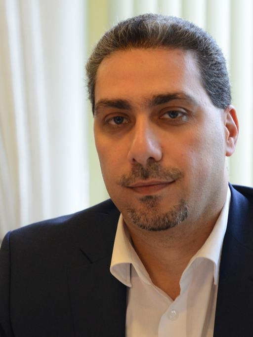 Der syrische Oppositionsvertreter Sadiqu Al-Mousllie