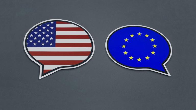 July 28th, 2020, Borkwalde, Brandenburg, Speech bubbles contain flags of the USA and the European Union.  |  usage worldwide