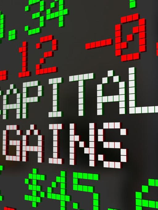 Auf einer Computerschautafel sind rote und grüne Zahlen sowie der Begriff "Capital Gains" in Pixelschrift zu sehen.