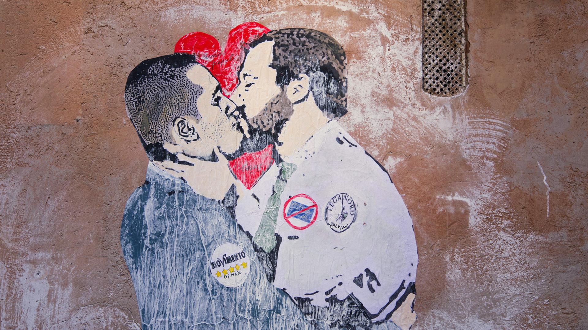 Ein Streetart-Motiv in Rom kommentiert die Regierungsbildung von Luigi di Maio, Parteichef der Fünf-Sterne-Bewegung, und Matteo Salvini, Vorsitzender der rechtspopulistischen Partei Lega, aufgenommen am 23.3.2018 Ein Streetart-Motiv in Rom kommentiert die Regierungsbildung von Luigi di Maio, Parteichef der Fünf-Sterne-Bewegung, und Matteo Salvini, Vorsitzender der rechtspopulistischen Partei Lega, aufgenommen am 23.3.2018