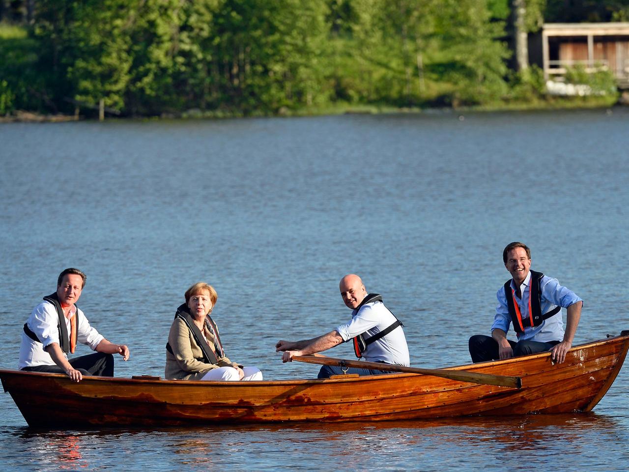 Der britische Premierminister David Cameron, Kanzlerin Angela Merkel, der schwedische Premierminister Frederik Reinfeldt und der niederländische Regierungschef Mark Rutte bei Harpsund.