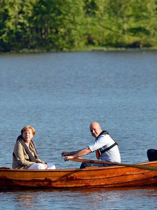 Der britische Premierminister David Cameron, Kanzlerin Angela Merkel, der schwedische Premierminister Frederik Reinfeldt und der niederländische Regierungschef Mark Rutte bei Harpsund.