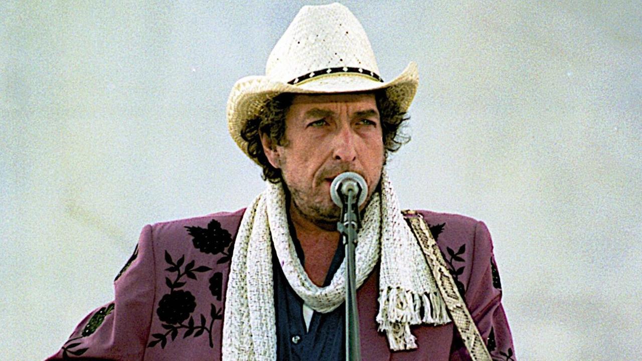 Bob Dylan mit Hut und Gitarre Bob Dylan mit Hut und Gitarre