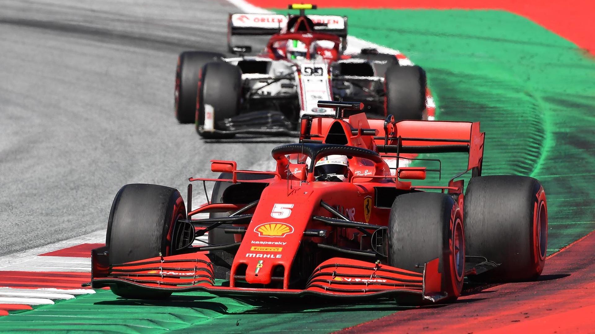 Ferrari-Fahrer Sebastian Vettel in seinem Auto Ferrari-Fahrer Sebastian Vettel in seinem Auto