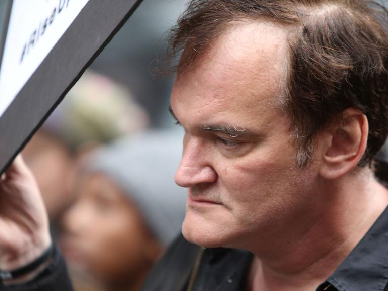 Der Regisseur Quentino Tarantino bei einem Protestmarsch am 24.10.2015 in New York gegen Polizeigewalt.