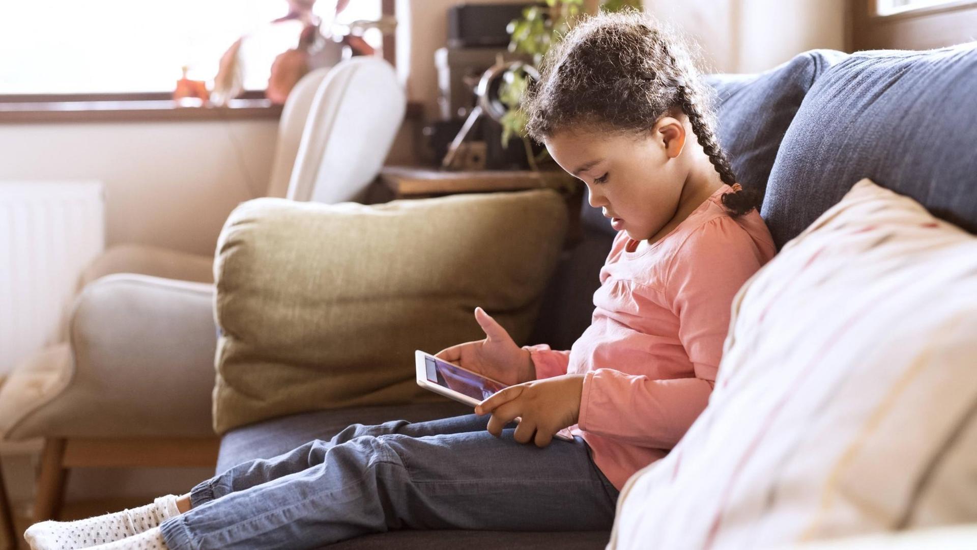 Little girl using sitting tablet, sitting on couch model released Symbolfoto property released PUBLICATIONxINxGERxSUIxAUTxHUNxONLY HAPF01486 Little Girl Using Sitting Tablet Sitting ON Couch Model released Symbolic image Property released PUBLICATIONxINxGERxSUIxAUTxHUNxONLY HAPF01486 Little girl using sitting tablet, sitting on couch model released Symbolfoto property released PUBLICATIONxINxGERxSUIxAUTxHUNxONLY HAPF01486 Little Girl Using Sitting Tablet Sitting ON Couch Model released Symbolic image Property released PUBLICATIONxINxGERxSUIxAUTxHUNxONLY HAPF01486