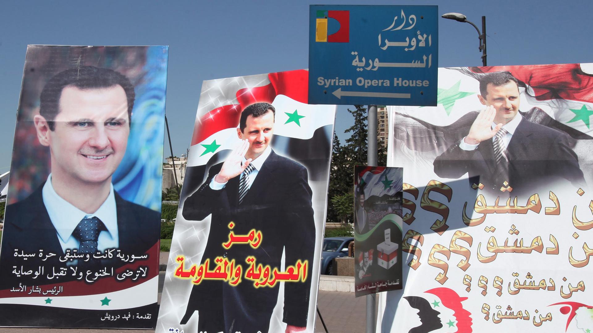 Wahlplakate von Bashar al-Assad in Damaskus. Wahlplakate von Bashar al-Assad in Damaskus.