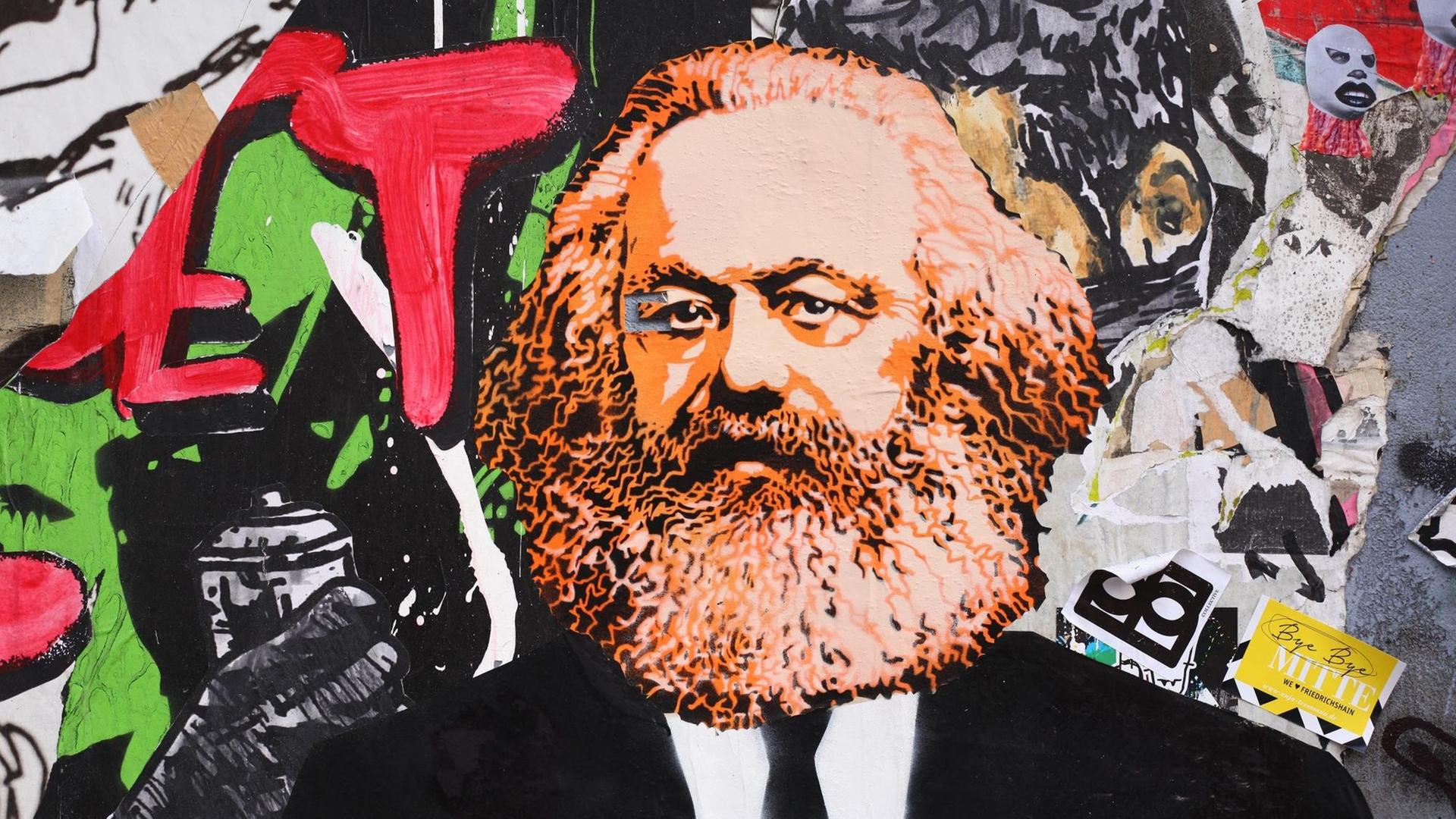 Ein Bild von Karl Marx als Streertart auf einer Mauer. Ein Bild von Karl Marx als Streertart auf einer Mauer.