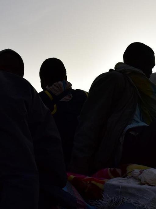 Westafrikaner in Niger, nachdem sie aus Libyen wegen der Gewalt dort geflohen sind.