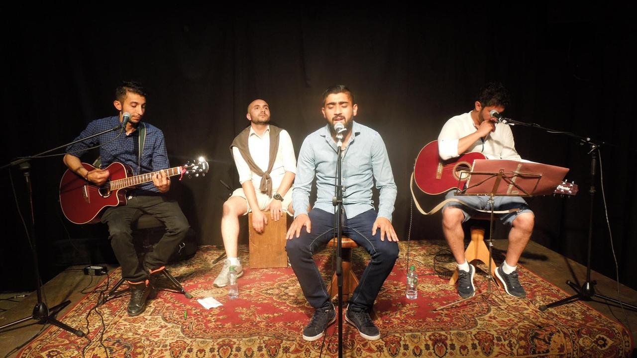 Die vier Bandmitglieder der Jimmy Mustafa Band spielen in Münster Die vier Bandmitglieder der Jimmy Mustafa Band spielen in Münster