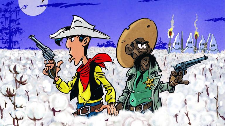 Das Titelbild des Comics "Fackeln im Baumwollfeld": Lucky Luke steht an der Seite des schwarzen Sheriffs Bass Reeves Das Titelbild des Comics "Fackeln im Baumwollfeld": Lucky Luke steht an der Seite des schwarzen Sheriffs Bass Reeves