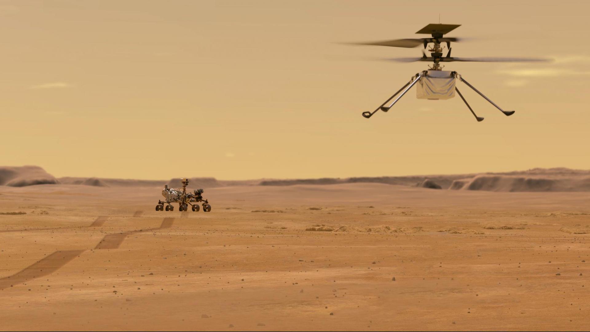 Der Mars-Rover im Hintergrund und der Mini-Hubschrauber.