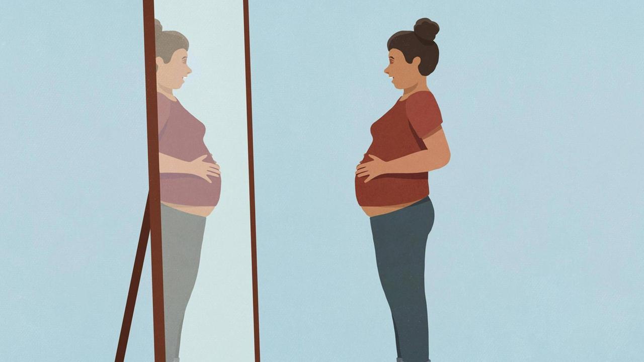 Eine hochschwangere Frau steht vor einem Spiegel. (Illustration) Eine hochschwangere Frau steht vor einem Spiegel. (Illustration)