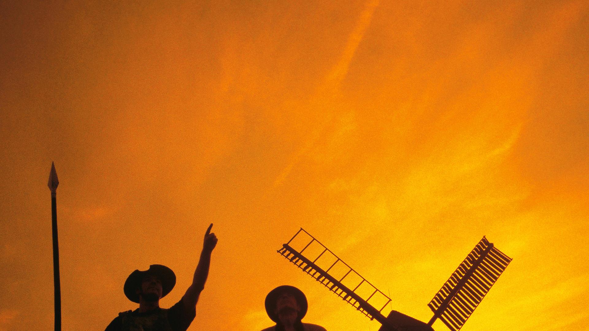Don Quijote mit Sancho Pansa vor einer Windmühle. Don Quijote mit Sancho Pansa vor einer Windmühle.