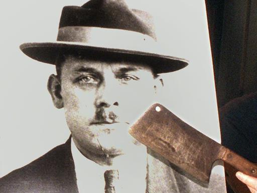 Ein Porträt des Mörders Fritz Haarmann mit einer Axt, seinem vermutlichen Mordwerkzeug